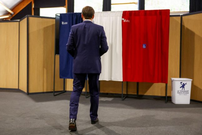 France's President Emmanuel Macron casting his ballot in the 2024 European Parliament election