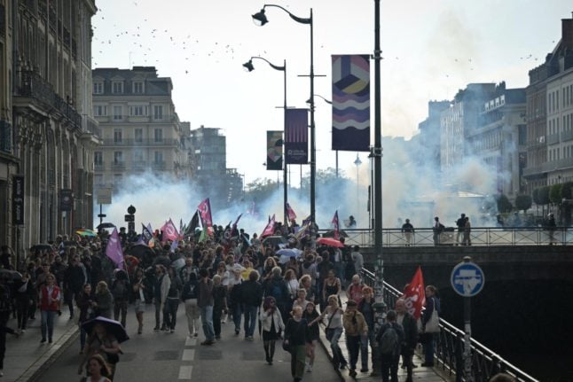 Protesters clash with police during a demonstration against the rise of far right parties in Rennes
