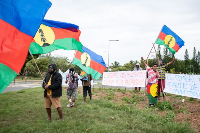 New Caledonia independence activists sent to France for detention