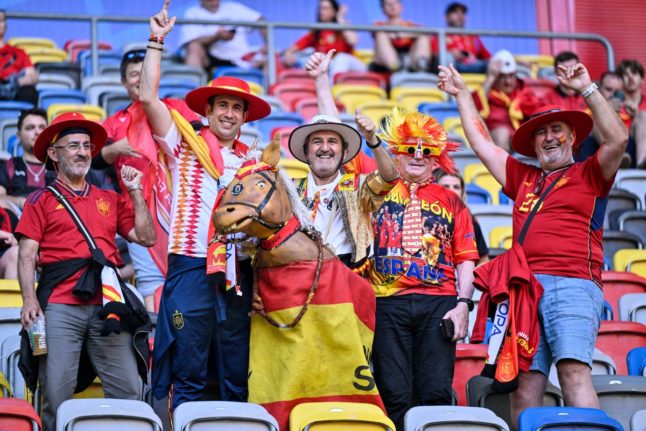 Fans of Spain cheer prior to the UEFA Euro 2024 Group B football match between Albania and Spain at the in Düsseldorf on June 24, 2024.