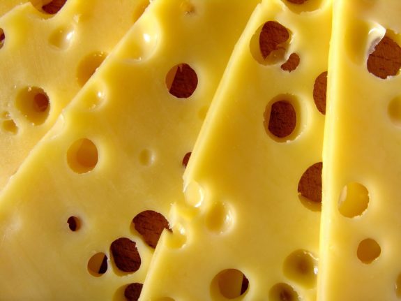 Swiss court to rule whether holes in Emmental cheese are too small
