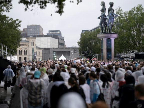 Pictured are crowds of people in Oslo.