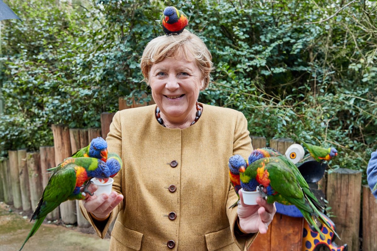 Angela Markel with birds