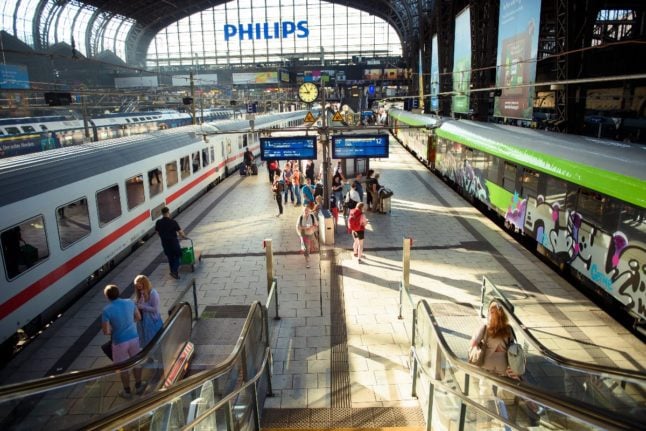 Train passengers at Hamburg main station.