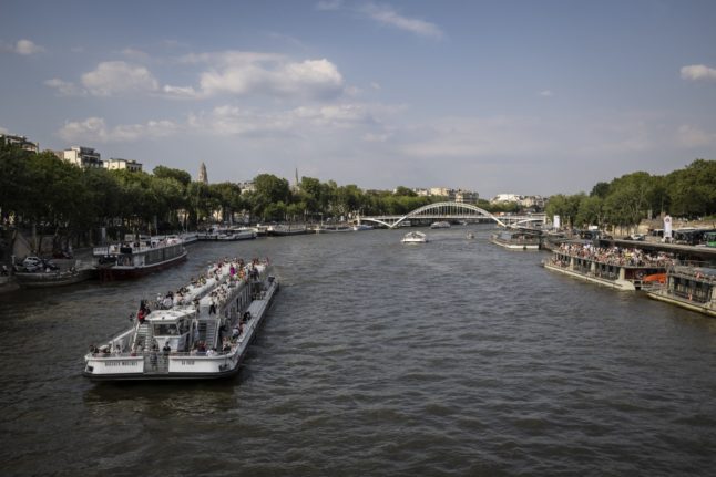 French sports minister swims in the Seine in boost for Olympics organisers