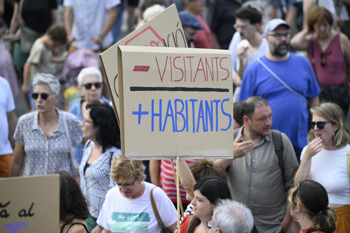 Barcelona residents protest against mass tourism