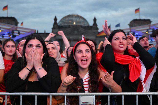 Turkey supporters at the public football viewing area in front of the Reichstag building in Berlin, Germany on July 6, 2024 during the UEFA Euro 2024 quarter-final football match Netherlands v Turkey played at Berlin's Olympic Stadium.