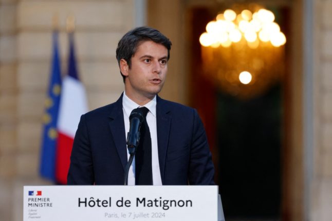 French PM eyes rebuilding political force after party backing