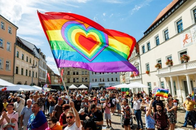 Participants cheer during the annual Christopher Street Day (CSD) Pride event in Pirna, eastern Germany
