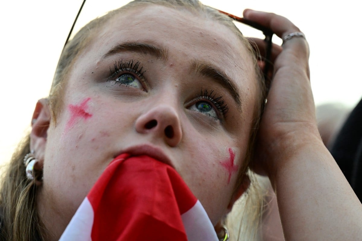 An England fan reacts at the public football viewing area during the UEFA Euro 2024 final football match between Spain and England in Berlin on July 14, 2024. 