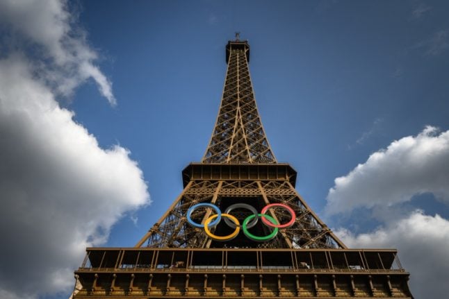 A photo shows the Olympic rings on the Eiffel Tower ahead of the Paris 2024 Olympic Games in Paris