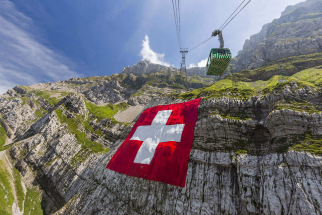 VIDEO: Watch how a giant Switzerland flag is hung on the side of a Swiss mountain