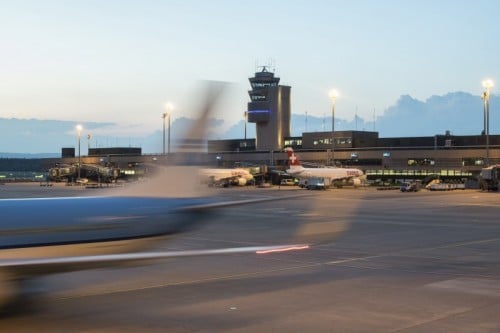 Why are Zurich and Geneva airports imposing flight restrictions?