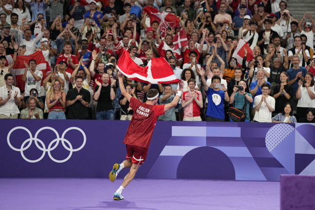 Denmark gets first Olympics gold as Axelsen retains badminton title