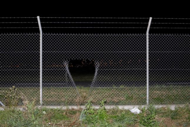 A hole in the fence at Leipzig/Halle airport.