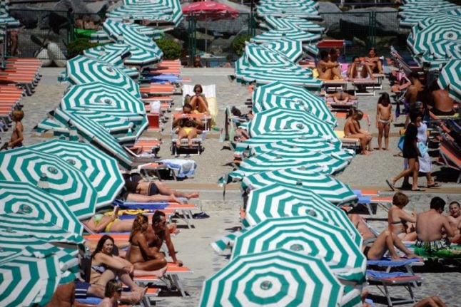 Beachgoers at a private lido near Santa Margherita Ligure, south of Genova