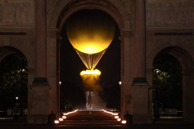 The moment the Olympic flame, attached to a balloon, lifted off during the opening ceremony of the Paris 2024 Olympic Games