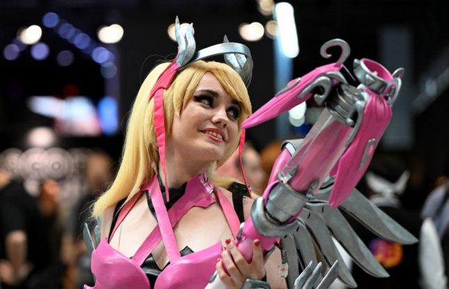 A cosplayer attends the media day at the Gamescom video games trade fair in Cologne, western Germany on August 21, 2024.