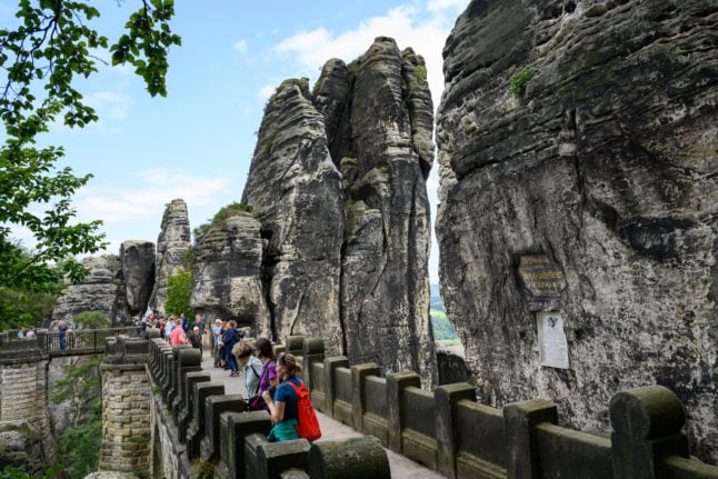 Tourists in Germany's Sächsische Schweiz or Saxon Switzerland - the country's most famous Swiss area.