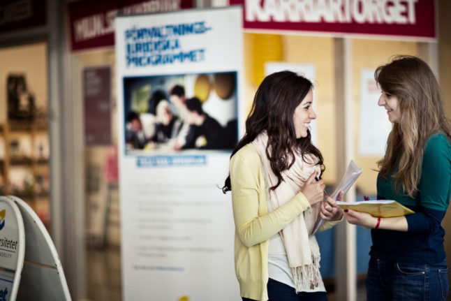 two university students talking