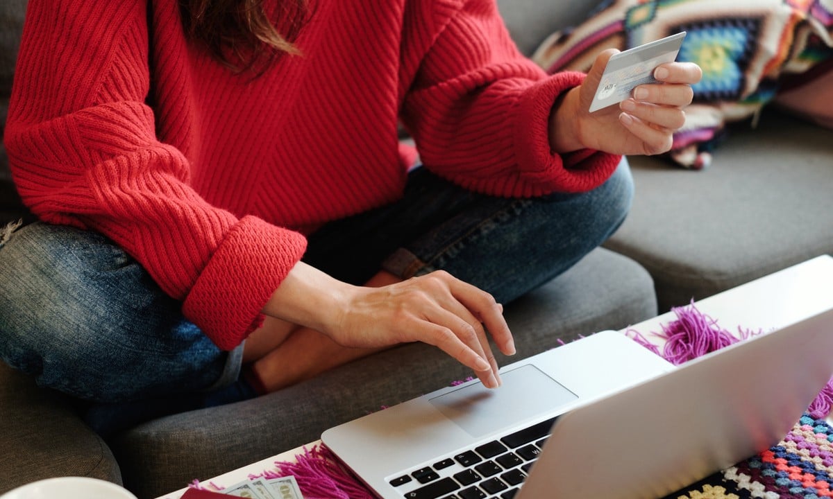 Woman paying by card online