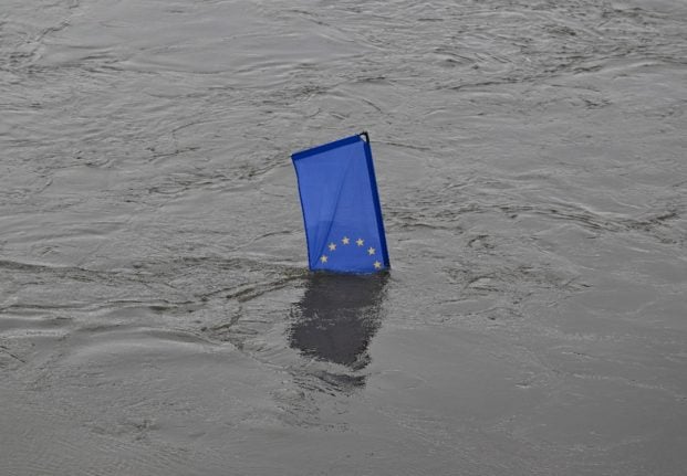 A European Union flag in the floodwaters of the German-Polish border river Oder.