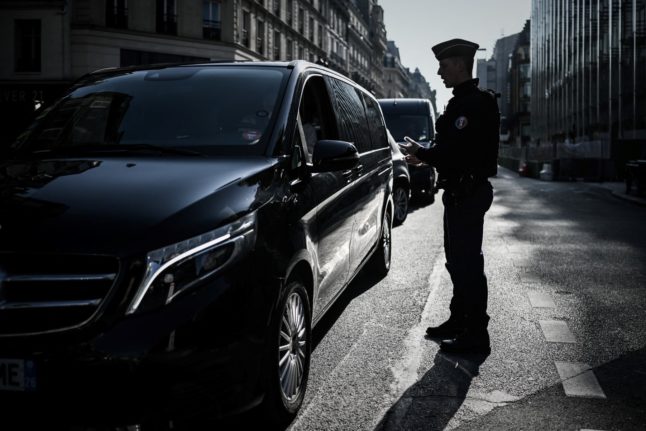 A French police officer at a traffic stop