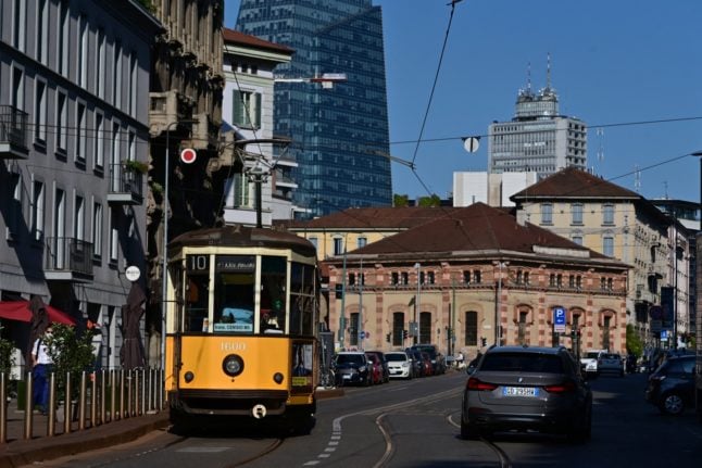 A picture taken in Milan's Porta Nuova neighbourhood shows a traditional city tram