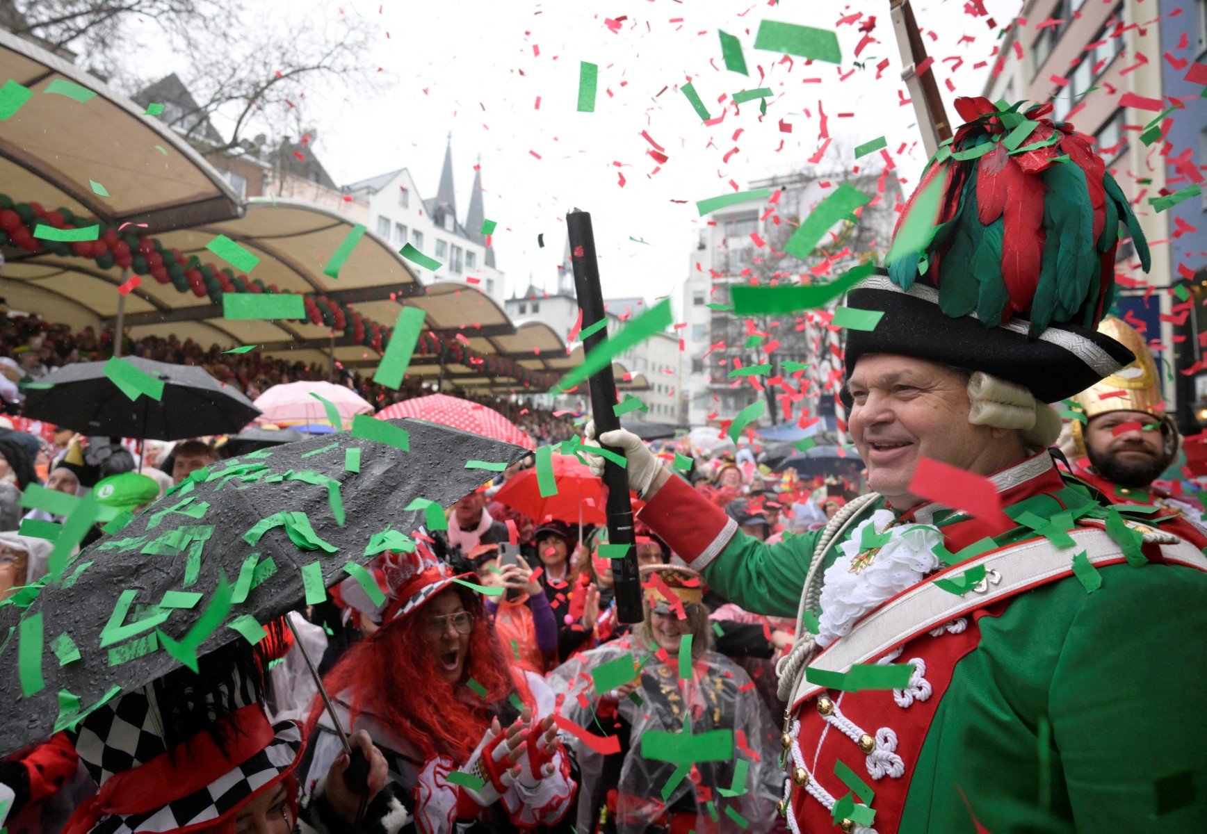 Revellers celebrate the start of the carnival season at 11.11 during the Women's Carnival Day in Cologne, western Germany