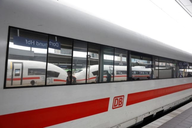 An ICE Inter City Express train of the German railway operator Deutsche Bahn (DB) is seen at a platform of the main station in Dortmund, western Germany, on July 10, 2024.