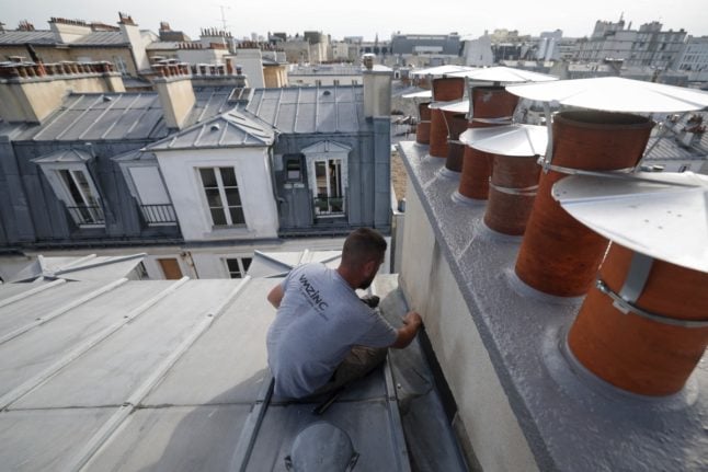 Paris zinc roofers seek elusive Unesco heritage status