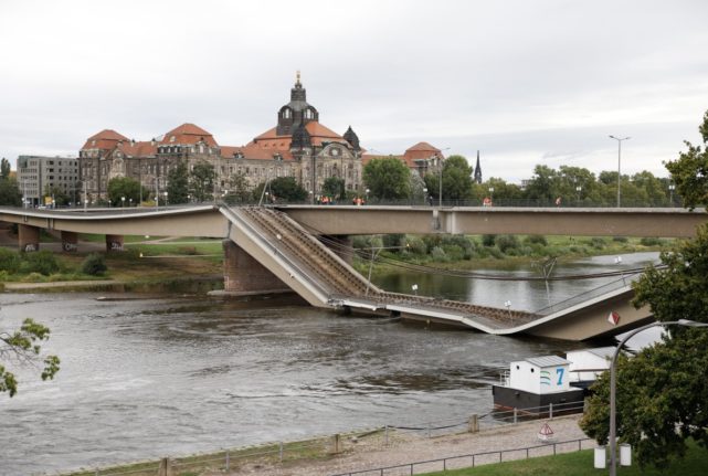 View of the the partially collapsed Carola Bridge (Carolabruecke) over the Elbe river in the city centre of Dresden, Saxony, eastern Germany, on September 11, 2024.