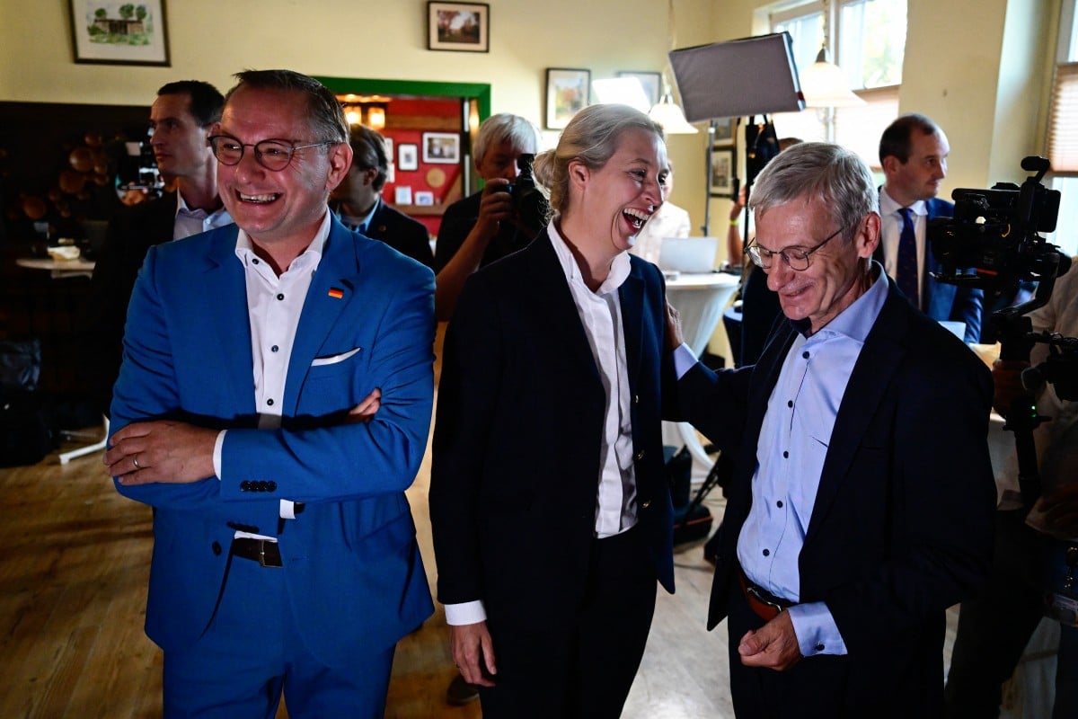 Co-leaders of Germany's far-right Alternative for Germany (AfD) party Tino Chrupalla and Alice Weidel and AfD top candidate for the regional elections in Brandenburg, Hans-Christoph Berndt.