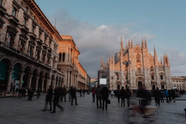 A view of Milan's Duomo cathedral at sunset in autumn