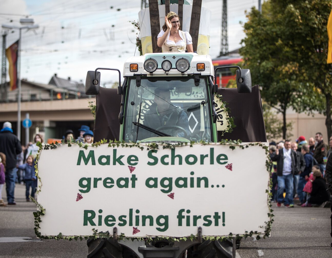 a float with the slogan Make Schorle great again... Riesling first at the German Wine Harvest Festival in Neustadt