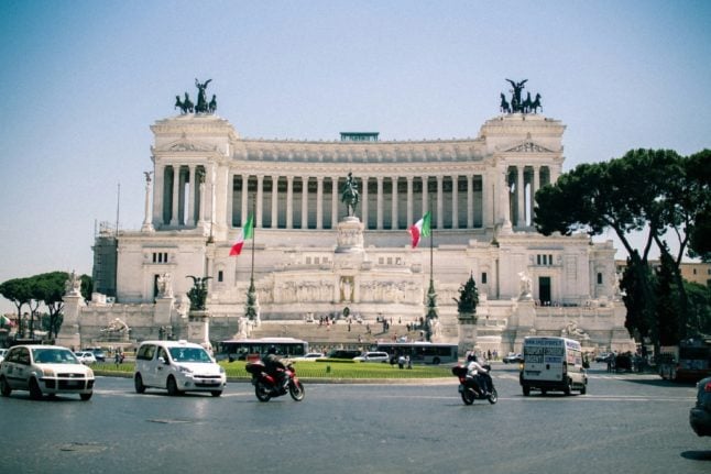 Vehicles pictured on a roundabout in Rome's Piazza Venezia