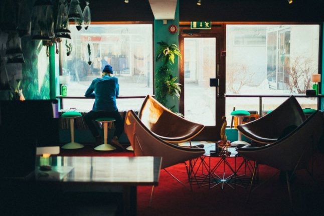 Pictured is a person in a cafe in Norway.