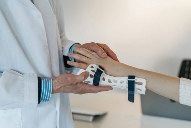 Pictured is a patient with a hand brace in Norway.