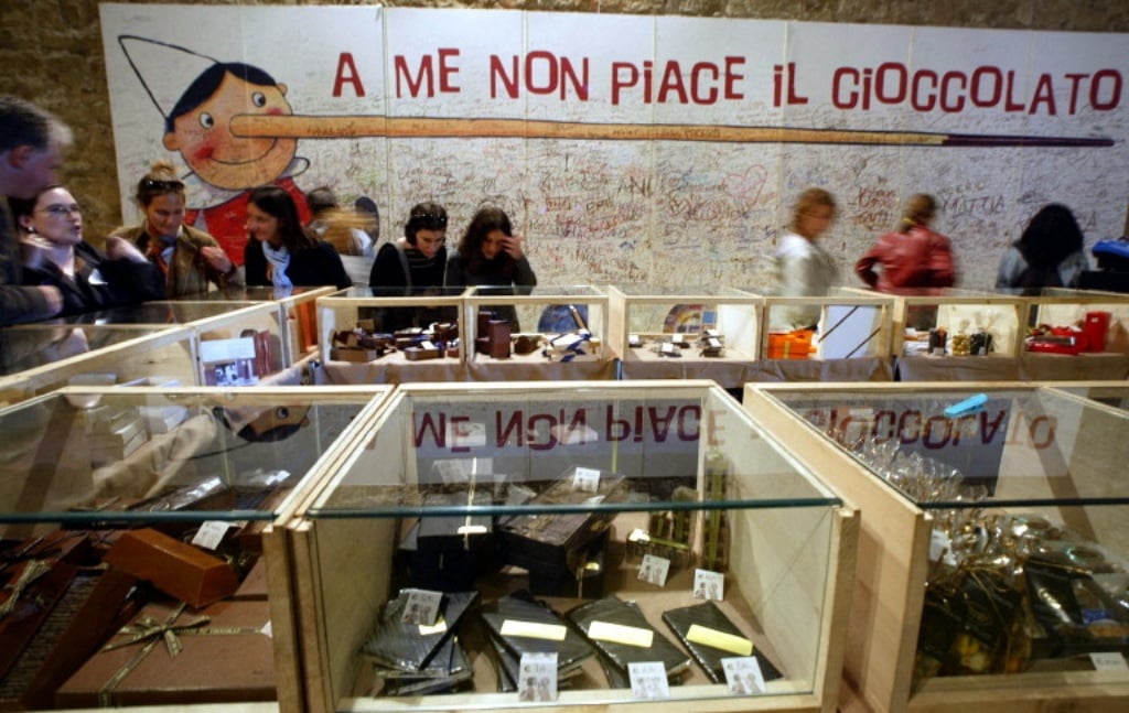 Visitors look at a stand during the Eurochocolate festival in Perugia