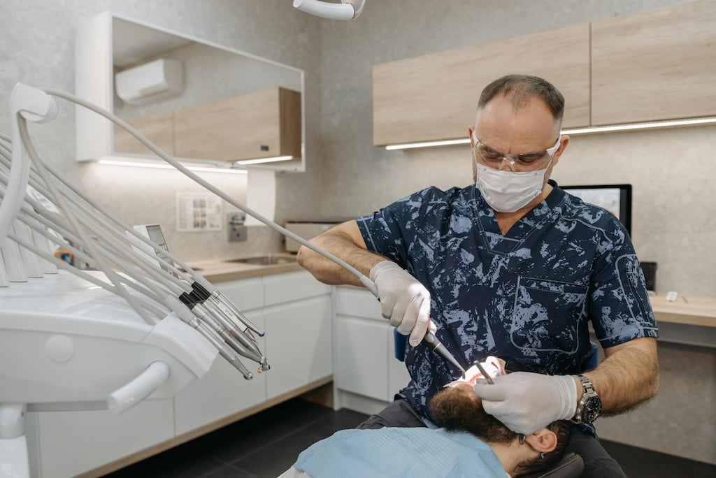 What dental care is free in Spain?