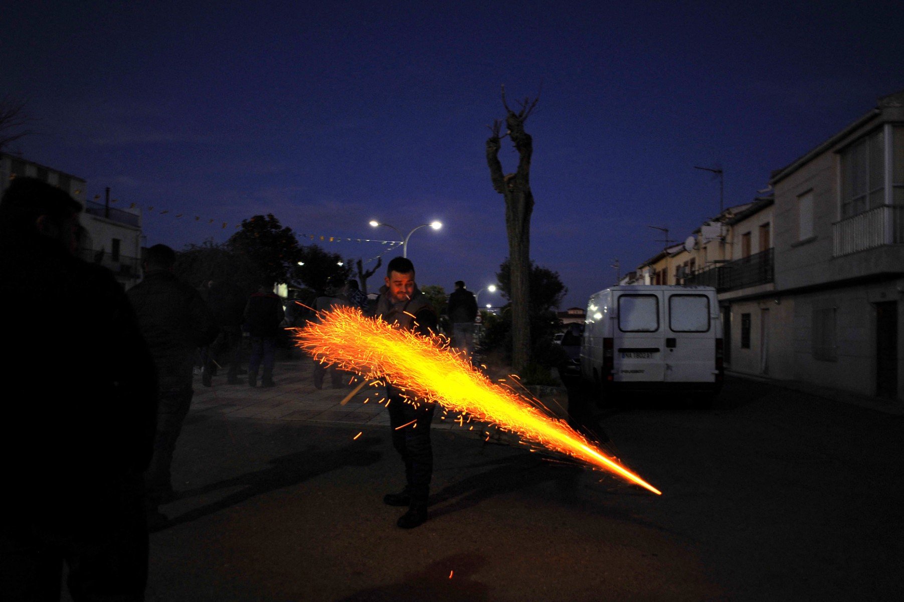 Why do Spaniards set off such loud firecrackers during New Year's?