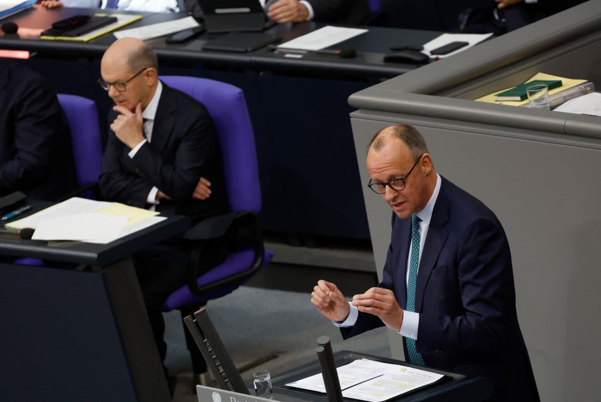 German election rivals Scholz and Merz trade blows on immigration