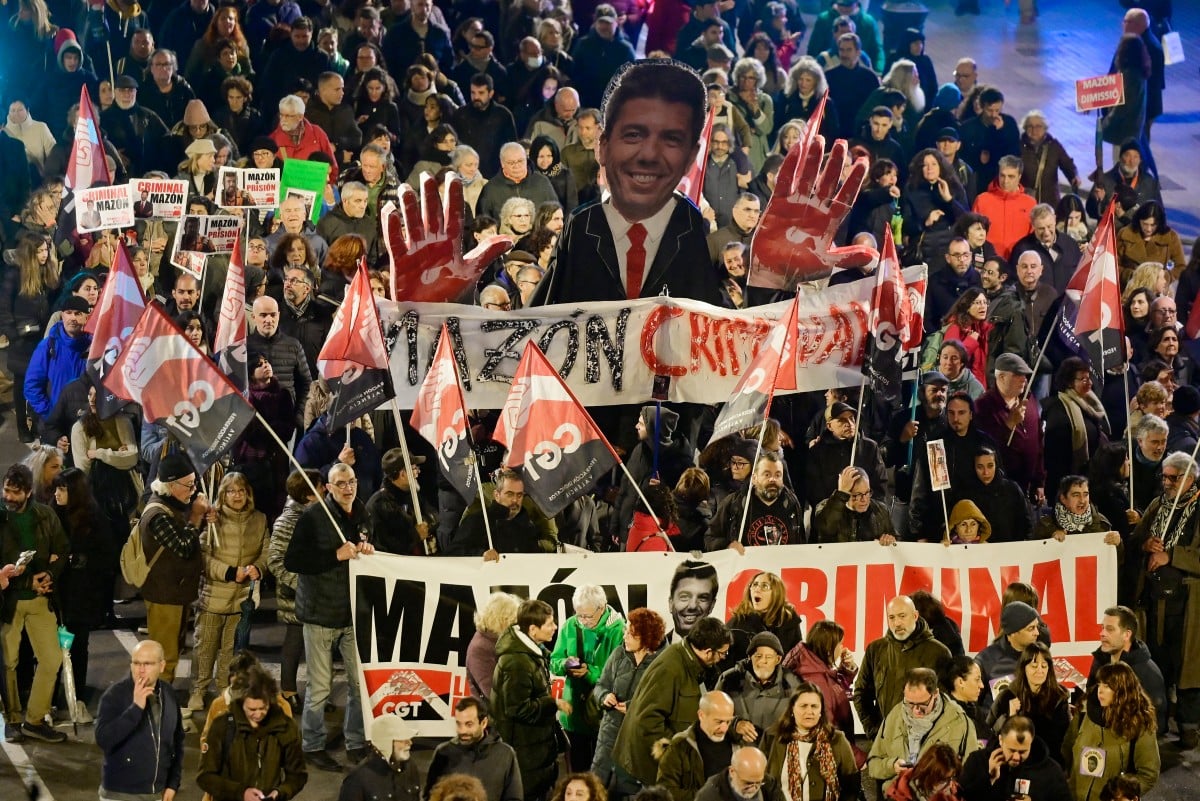 Tens of thousands rally against leader of flood-hit Spain region