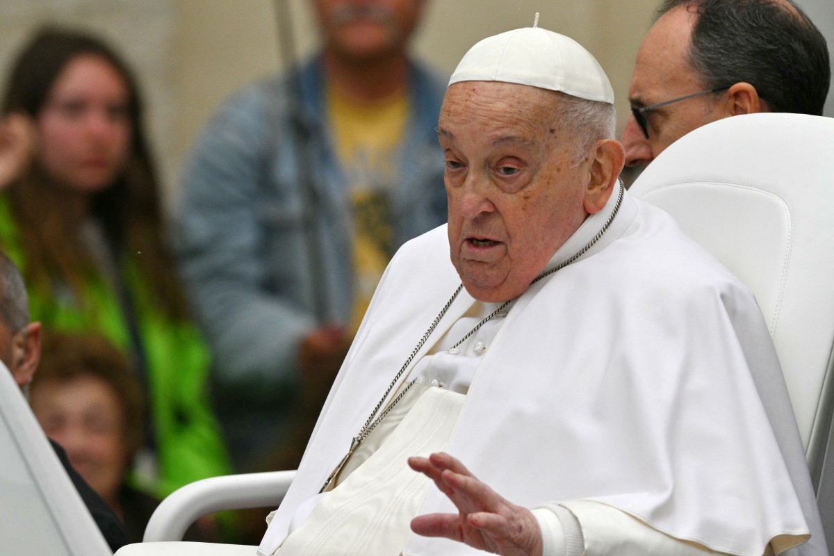 Pope Francis waves to the crowd from the popemobile after the Easter mass, at St Peter's square in the Vatican