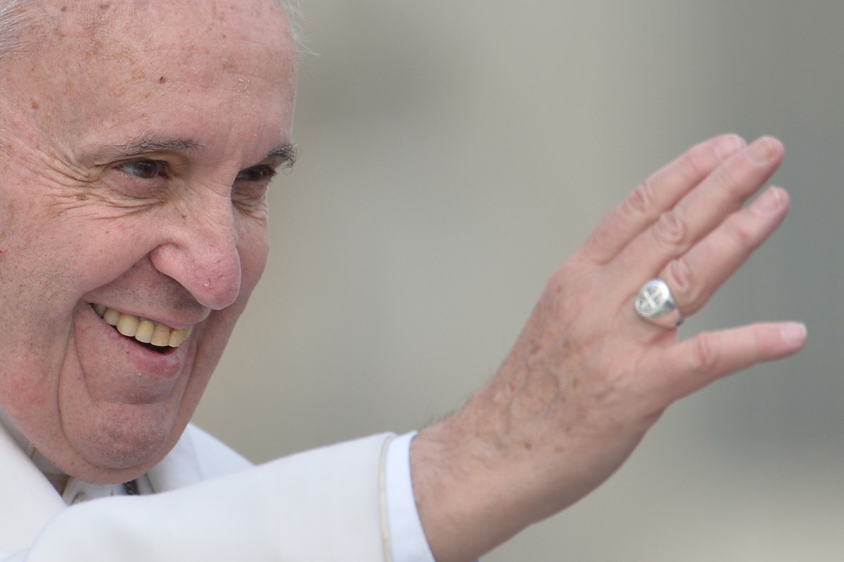 (FILES) Pope Francis greets the crowd during an audience to the Padre Pio Prayer Groups, in Vatican