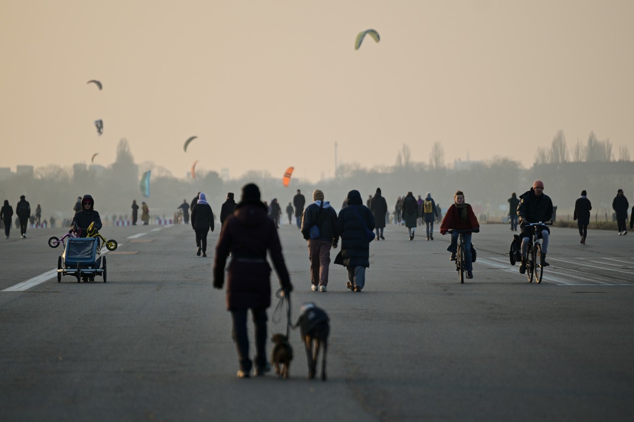 People walk on Berlin Tempelhofer Feld