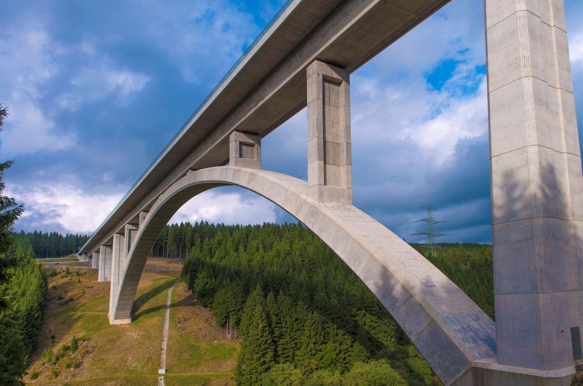 A bridge beneath a blue sky in the German countryside