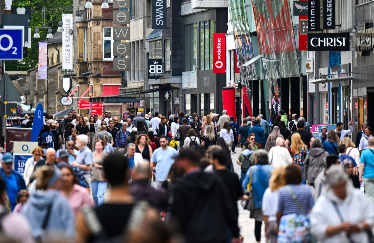 View of a crowded shopping street in Dortmund Germany.