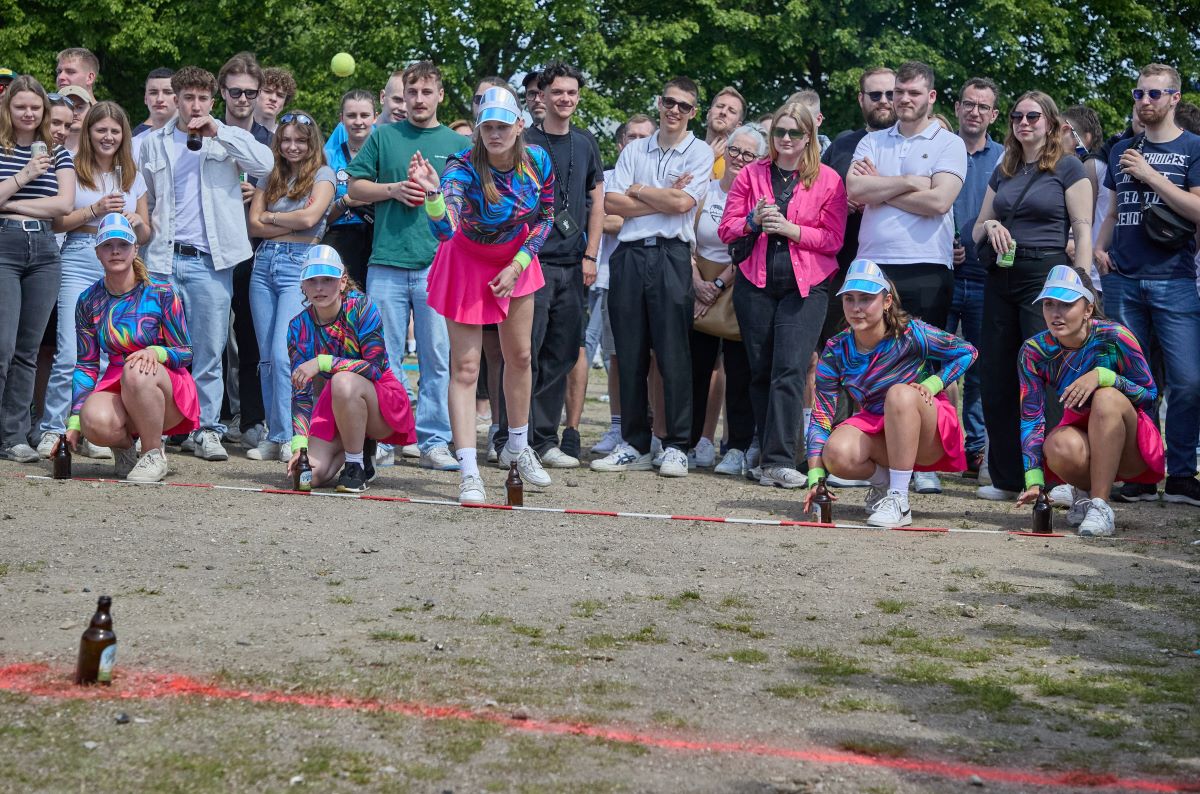 A team member throws the ball at the Flunkyball World Championship. 