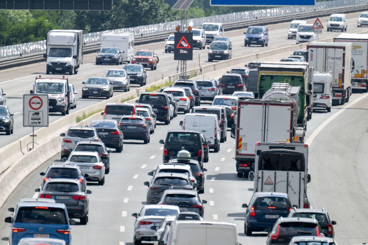 numerous cars in traffic on a German autobahn